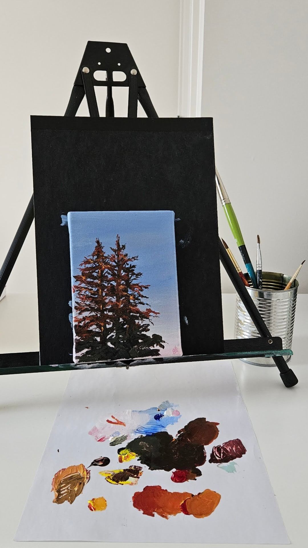 Small painting of a spruce tree