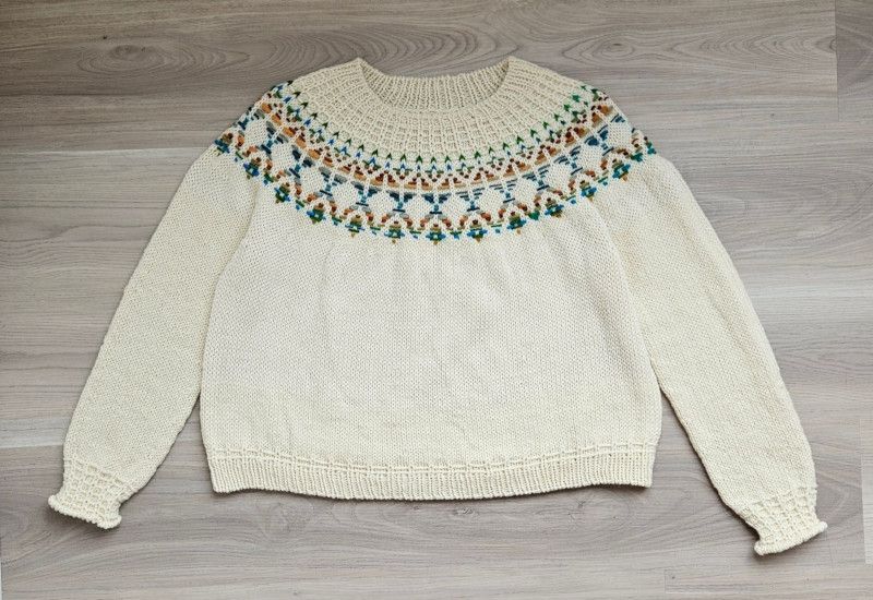 White sweater with round yoke colorwork