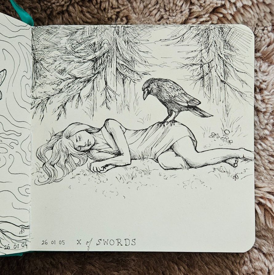Girl napping on the forest floor, with crow